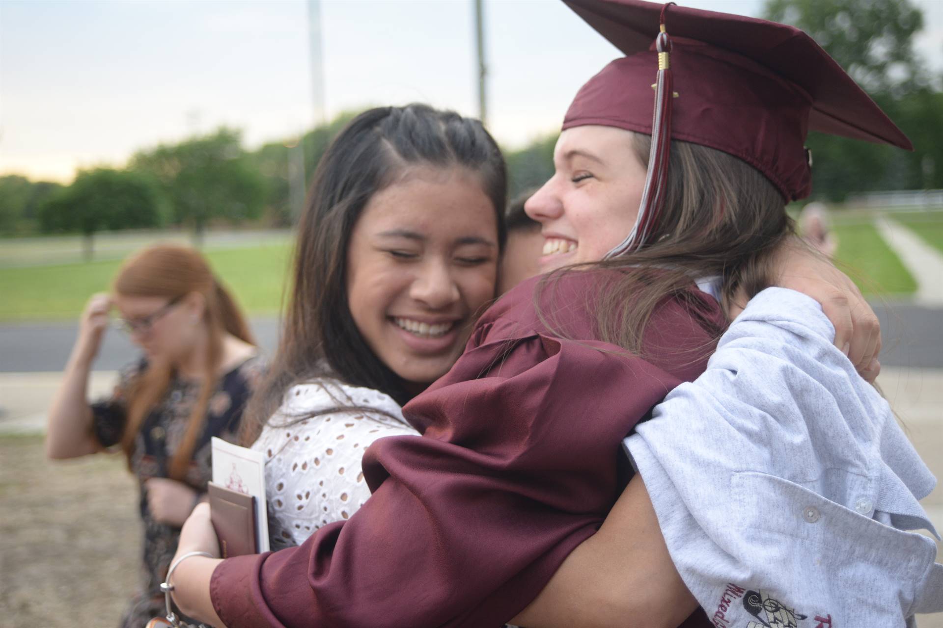 Hug between two RHS graduates
