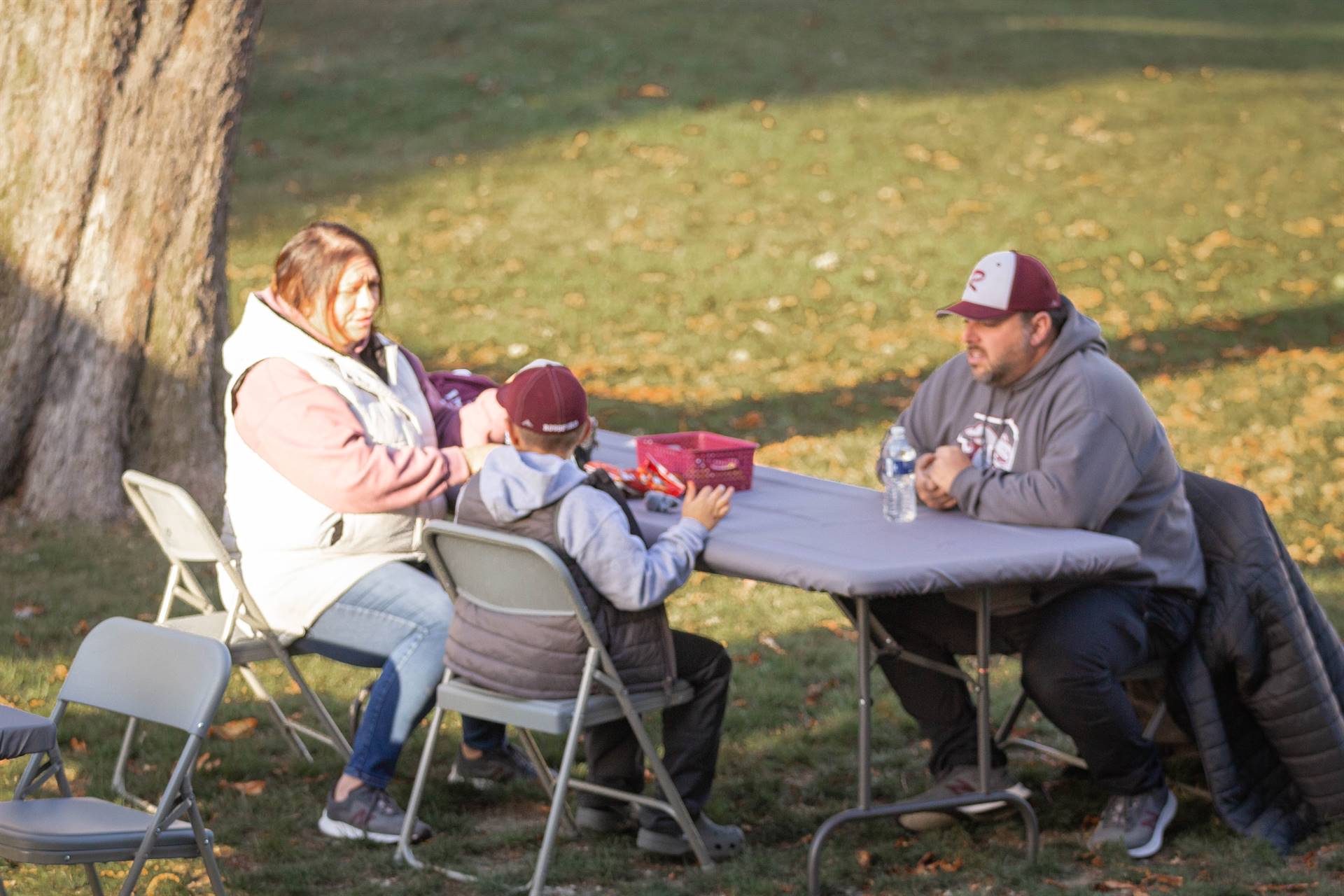 Rossford Alumni Tailgate - Family eating together.