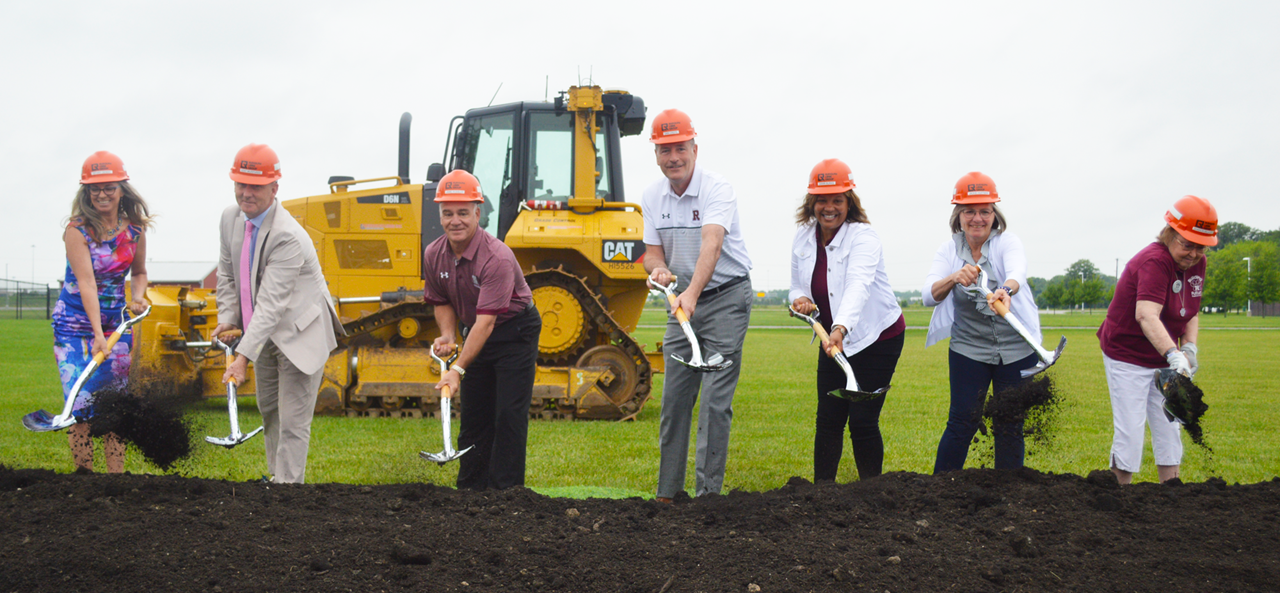 Groundbreaking Ceremony for Multi-Use Building. Rossford Board of Education along with Superintendent and Treasurer shoveling dirt.