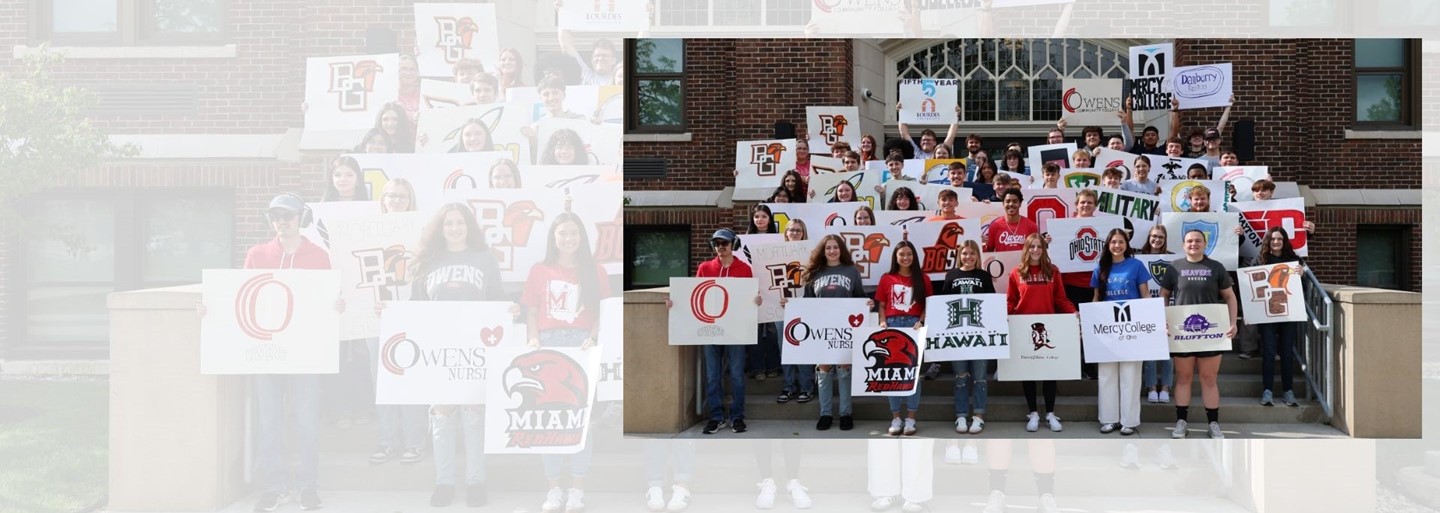 Photo of our Class of 2025 members holding up signs of future college, workforce or military service plans.